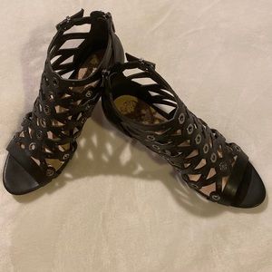 Vince Camuto black leather heels.  Worn once. In great condition.
